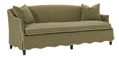 A three-seater sofa with a curved back and flared arms. It features a tailored skirt with a scalloped hem and is accented with contrast piping along the edges of the cushions, arms, and skirt. Two matching throw pillows are placed on the sofa. The sofa is elevated by four dark, block-style legs. — 3D model