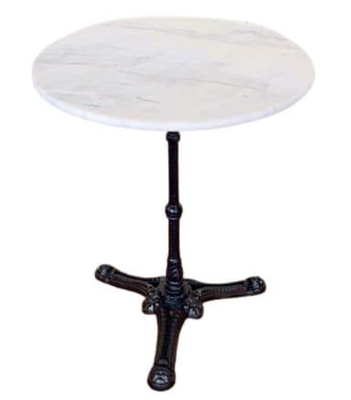 A round bistro table featuring a white marble top with subtle grey veining, supported by a single, dark-colored, ornately cast iron pedestal base. The base has four scrolling feet for stability and decorative elements on the column. — 3D model