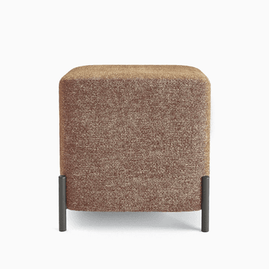A square-shaped ottoman with rounded edges, upholstered in a textured fabric. It is supported by four slender, cylindrical legs positioned at the corners, extending slightly beyond the base. — 3D model
