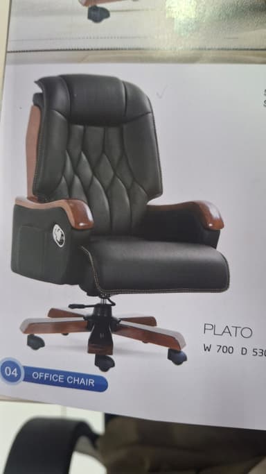 An executive swivel office chair featuring black padded upholstery, wooden armrests, and a five-star wooden base with casters. The backrest has a quilted pattern, and the chair appears designed for comfort and professional aesthetics. — 3D model