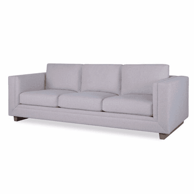 A three-seater sofa upholstered in a light-colored textured fabric. The sofa has a modern, minimalist design with clean lines, square arms, and back cushions. It is supported by a low-profile wooden base. — 3D model