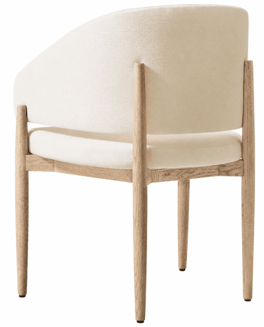 A modern dining armchair featuring a continuous rounded upholstered backrest and integrated arms, set upon a solid wood frame with tapered legs. The upholstery is a light, neutral-toned fabric. — 3D model