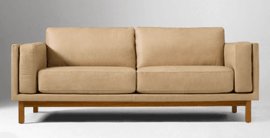 A modern two-seater sofa upholstered in light tan leather, featuring an exposed light wooden frame and slender tapered wooden legs. The sofa has distinct box-style seat and back cushions, and relatively thin, straight armrests. — 3D model