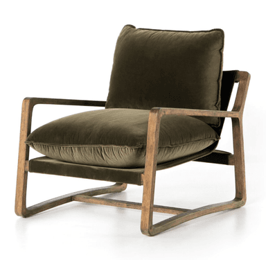 A rustic-style armchair featuring a robust, dark-stained wooden frame with thick, plush olive green velvet cushions for the seat and backrest. The frame has a simple, somewhat blocky construction, with visible wood grain and exposed armrests. The cushions are generously padded, providing a comfortable and inviting appearance. — 3D model
