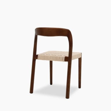 A wooden dining chair with a woven seat. The chair features a solid wood frame with gently curved backrest and legs. The seat is constructed from tightly woven natural fiber ropes or cords, providing a textured surface. — 3D model