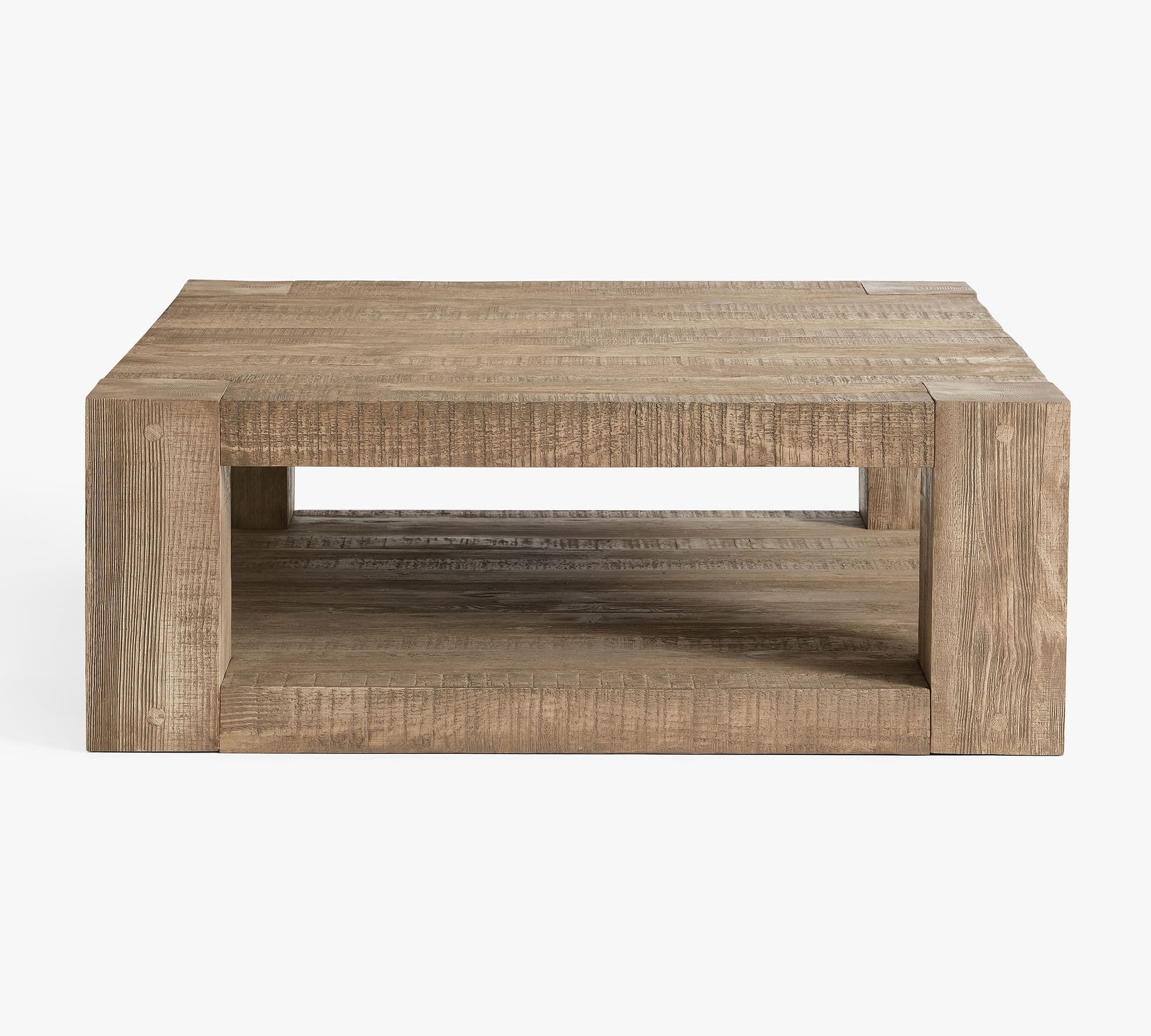 A square, block-style coffee table constructed from thick, distressed reclaimed wood, featuring a solid top and an open lower storage shelf. — 3D model
