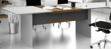 A modern, rectangular table featuring a central wooden top and white end sections, supported by solid panel legs and incorporating a dark gray modesty panel. — 3D model