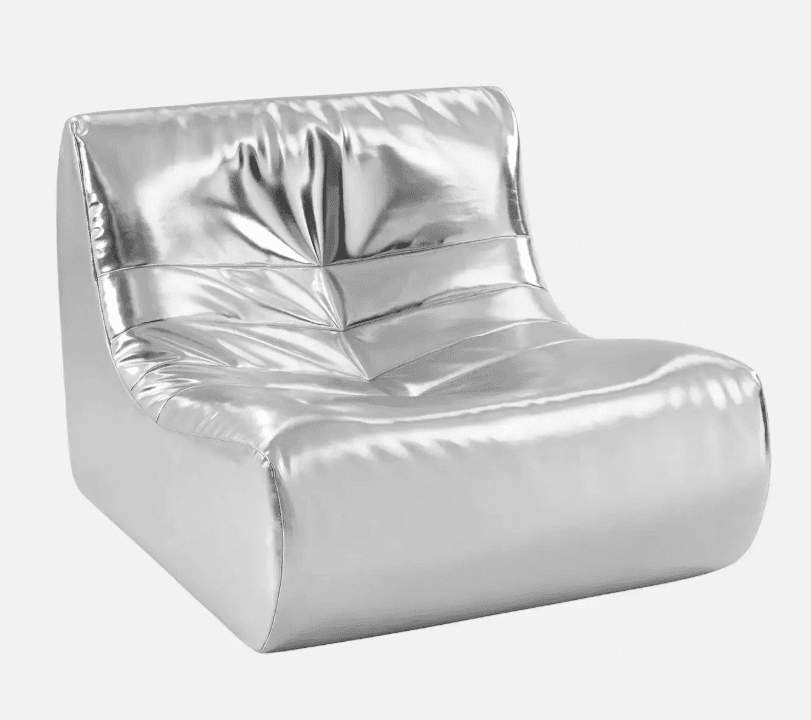 A modern, single-seat armchair with a low profile and a distinctive shiny, metallic silver finish. The upholstery features horizontal channeling or tufting on the backrest and seat, creating a series of soft, rounded folds. The overall form is organic and somewhat rounded, without rigid lines, suggesting a comfortable and perhaps playful design. — 3D model