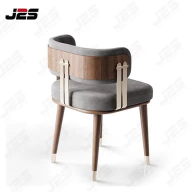 A contemporary dining armchair featuring a curved upholstered backrest and seat, an external wooden back panel, tapered wooden legs, and distinctive gold-toned metal accents. — 3D model