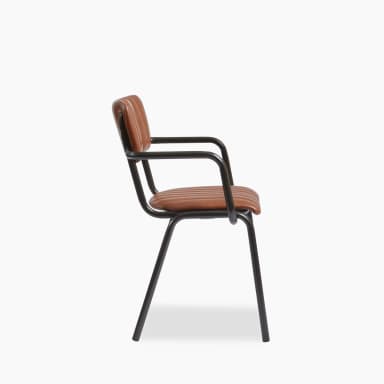 A modern armchair with a low back and armrests. The seat and backrest are upholstered with brown material featuring vertical channel tufting. The frame and legs are constructed from black metal, forming a minimalist silhouette. — 3D model