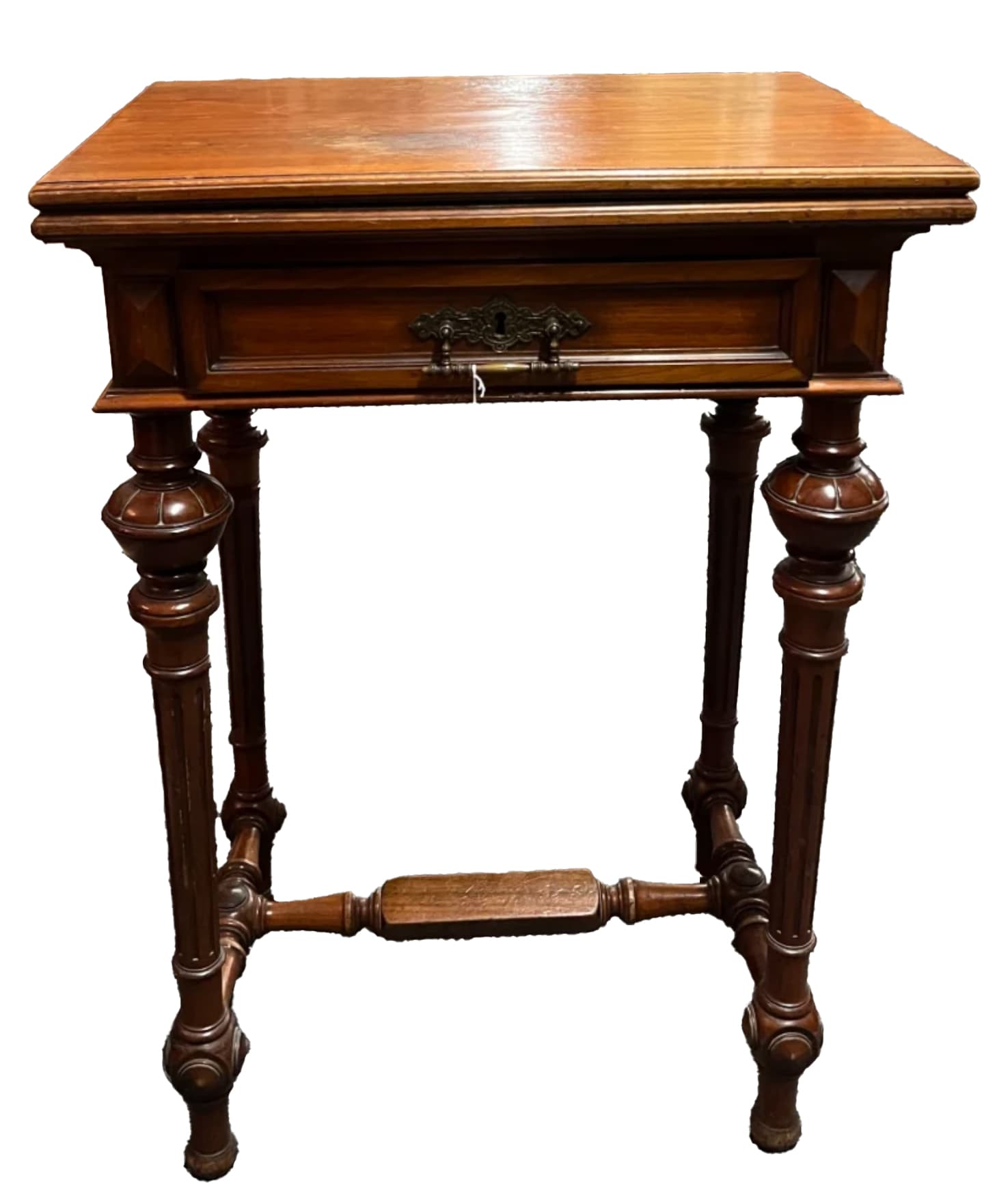 A dark wood end table with a single drawer, ornate legs, and a stretcher connecting the legs. The tabletop is rectangular with a slightly beveled edge. The drawer has a decorative metal pull and keyhole. The legs are turned and feature bulbous decorative elements, and they are connected by a horizontal stretcher with carved details. — 3D model