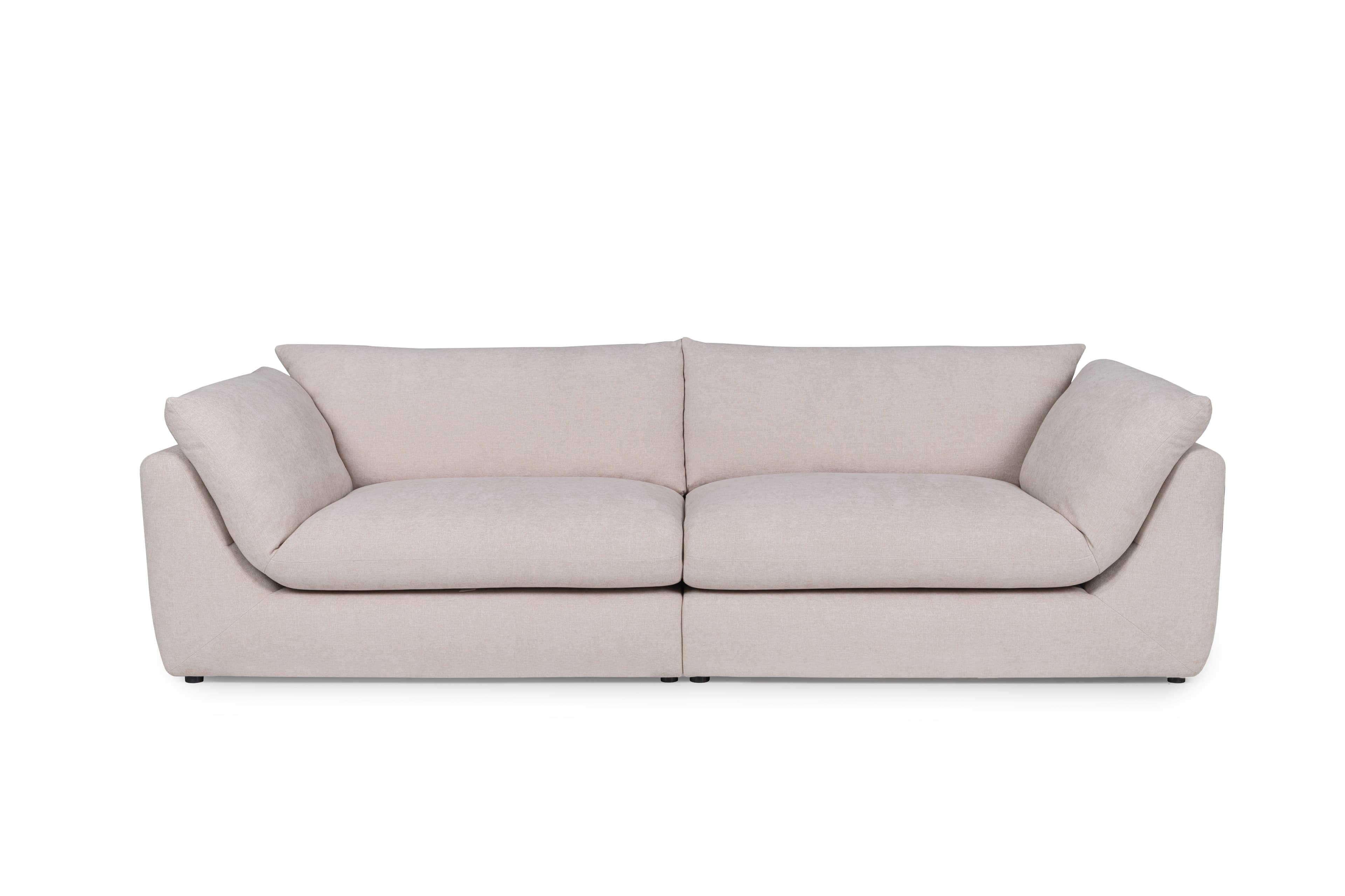 A modern, low-profile sofa with a modular design, featuring two seat cushions and plush back cushions. The sofa has rounded edges and appears to be upholstered in a light-colored fabric. It is presented on a black background. — 3D model