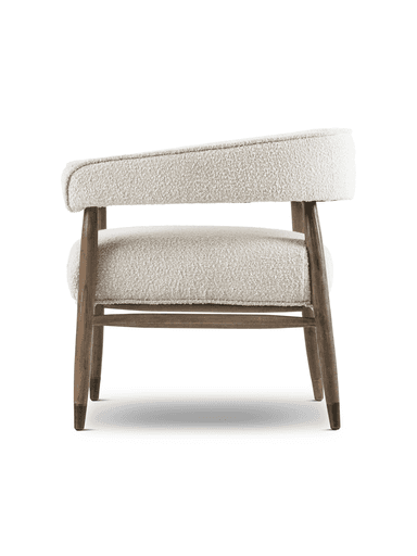 A contemporary upholstered accent armchair featuring a rounded backrest and seat, both covered in a plush, textured off-white bouclé fabric. The frame and legs are constructed from dark-stained solid wood, with the legs tapering downwards, ending in subtle foot caps. The armrests are integrated into the continuous curve of the backrest, providing a comfortable and inviting silhouette. — 3D model