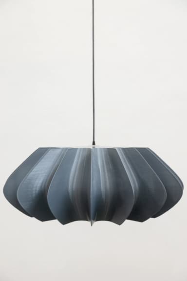 A contemporary pendant lamp featuring a dark gray, fluted shade suspended by a single cord. The shade has a distinctive pleated or scalloped design, creating a sculptural, geometric form. The material appears to be a matte, textured plastic or resin. — 3D model