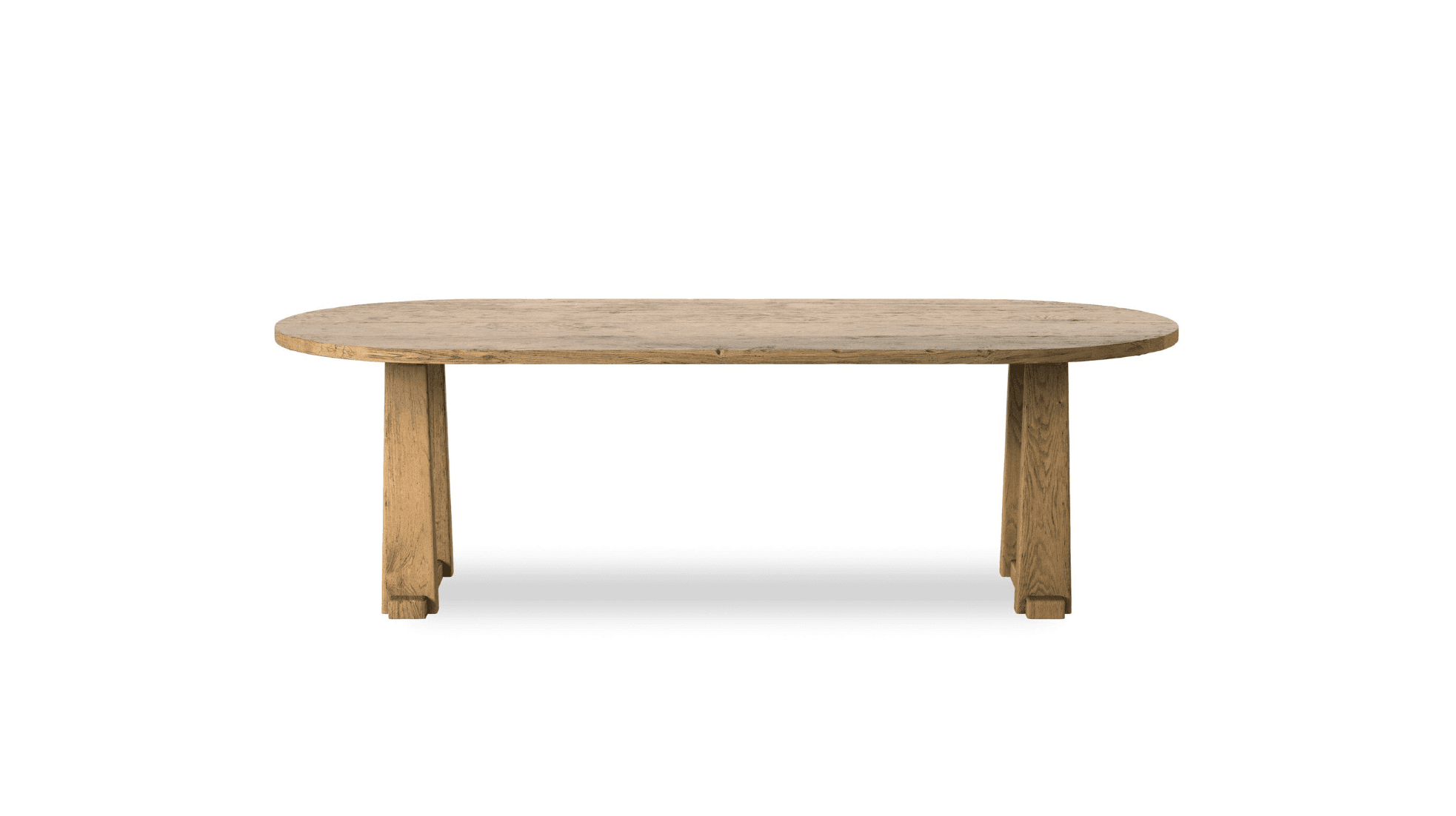 A low-profile coffee table featuring an oval-shaped top and two substantial, rectangular slab-style legs. The entire piece is constructed from solid wood, presenting a natural, light brown hue with visible grain and a somewhat rustic, possibly distressed, finish. — 3D model
