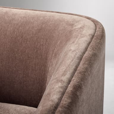 A contemporary upholstered club armchair featuring a single, removable seat cushion, integrated flared arms, and a low back, all covered in a textured, brown fabric. The chair stands on four tapered wooden legs. — 3D model