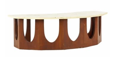 A coffee table with a light-colored, possibly marble or laminate, rectangular top with slightly beveled edges. The base consists of four vertical wooden elements, each with a large, semicircular cutout, arranged in a staggered pattern to form a visually open support structure. The wooden elements are dark brown and appear to be wood. — 3D model