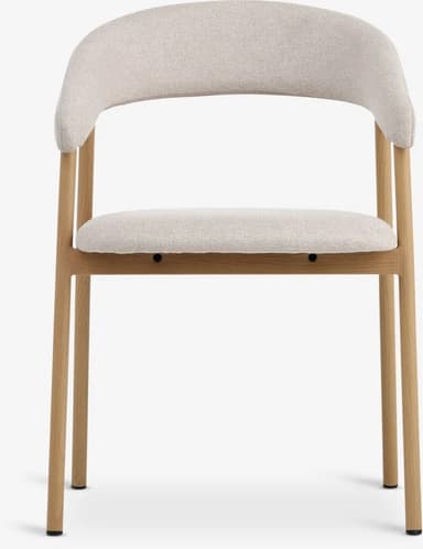 An upholstered dining chair featuring a light natural wood frame and a light beige, textured fabric. The backrest is gently curved, extending to form integrated armrests. The seat and back are fully upholstered, providing a soft seating experience. — 3D model