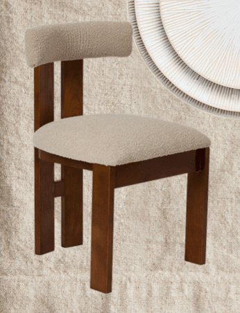 A contemporary wooden accent chair with a dark brown frame and light beige boucle fabric upholstery. It features a low, gently curved backrest and a square-shaped seat, both padded. The wooden frame consists of straight, thick legs with simple horizontal stretcher supports, creating a sturdy and minimalist design. — 3D model