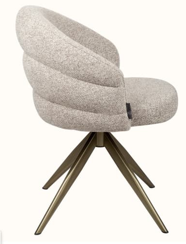 A modern upholstered armchair with a curved backrest and a swivel base. The seat and back are padded and covered in a textured, light-colored fabric. The base consists of four splayed metal legs with a brushed brass finish, converging at a central point. — 3D model
