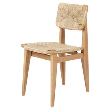 A dining chair featuring a light natural wood frame and a seat and backrest meticulously hand-woven from natural fiber, with subtly splayed legs. — 3D model