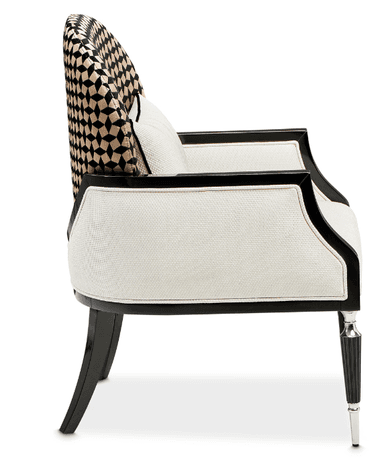 A contemporary barrel-back accent chair featuring a glossy black lacquered wood frame and striking geometric patterned upholstery. The chair's back and sides are encased in a lighter, solid-colored fabric, while the inner backrest cushion boasts a bold black and beige rhomboid pattern. The legs are tapered, finished in black lacquer, and fitted with metallic silver caps. — 3D model
