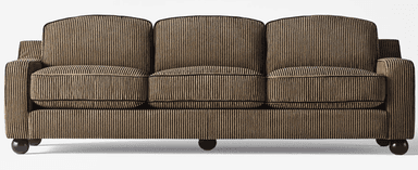 A close-up view of a sofa with a striped upholstery fabric. The sofa features plump cushions, rounded armrests, and short, spherical black legs. The fabric has a ribbed texture with vertical stripes in alternating shades of gold and black. — 3D model
