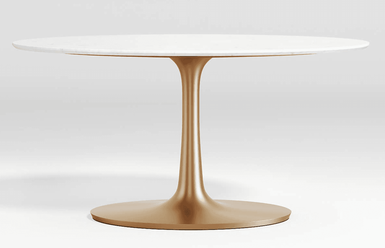 A round table featuring a polished white marble top and a golden-toned, trumpet-shaped pedestal base. The base expands into a wide circular foot for stability. — 3D model