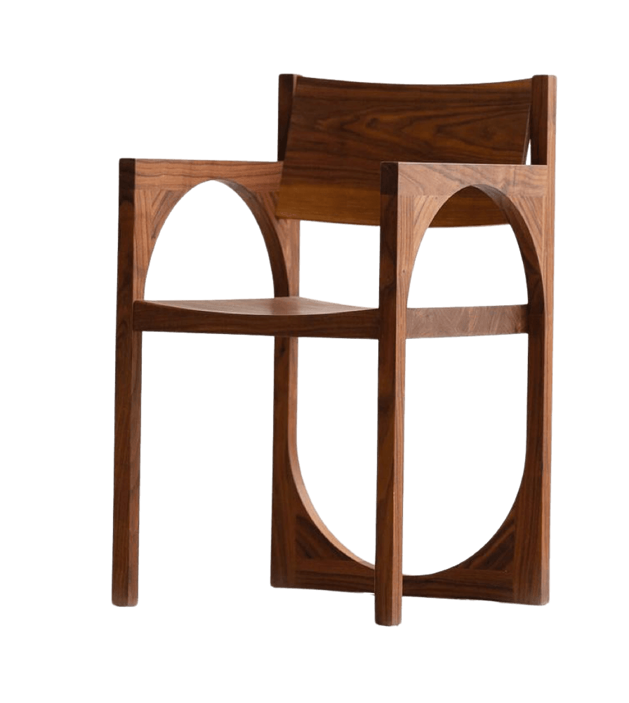 A wooden armchair with a distinctive design featuring large, semi-circular cutouts on the sides of the seat and a gently curved backrest. The armchair is constructed from solid wood, likely walnut, showcasing its natural grain patterns. It has a modernist or sculptural aesthetic. — 3D model