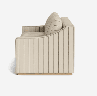 A contemporary two-seater sofa or loveseat upholstered in a light, striped fabric and resting on a wooden plinth base. The back and armrests feature vertical stripes, while the seat and back cushions have horizontal stripes. The design is low-profile with gently curved arms. — 3D model