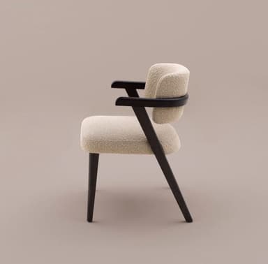 A contemporary armchair featuring a light, textured boucle upholstery on the seat and curved backrest, supported by a dark-stained wooden frame with integrated armrests and tapered legs. — 3D model