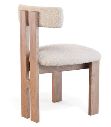 A modern chair with a light wood frame and upholstered seat and backrest. The frame has a distinctive H-shaped structure at the rear legs. The seat and backrest are padded and covered in a textured, neutral-toned fabric. — 3D model