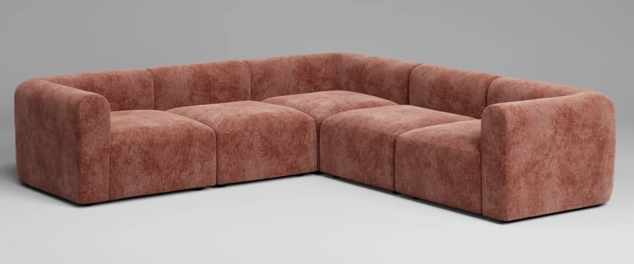 An L-shaped modular sectional sofa featuring plush, rounded edges and upholstered in a textured, muted mauve fabric. The design emphasizes comfort and flexibility, allowing individual units to be reconfigured. — 3D model