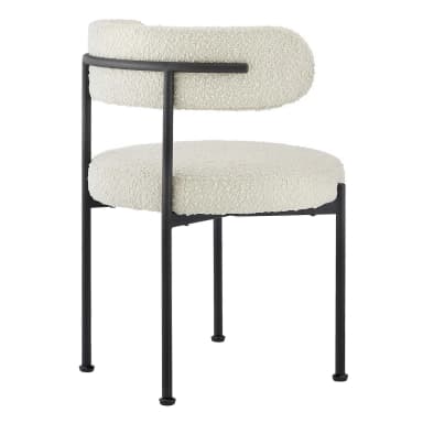 A modern armless chair featuring a rounded, padded seat and a cylindrical, horizontal backrest, both upholstered in a cream-colored boucle fabric. It rests on four slender, black metal legs. — 3D model