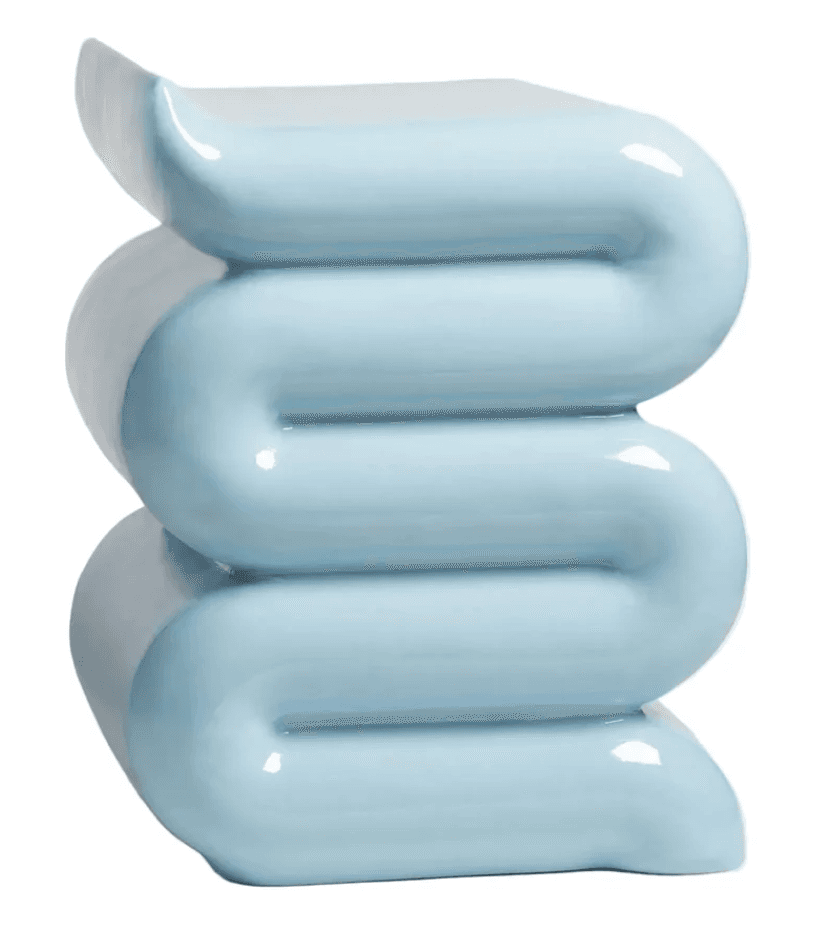 A glossy, light blue, sculptural furniture piece featuring a continuous, undulating wave-like form. It functions as either a side table or a stool, characterized by smooth, rounded edges and a reflective surface. — 3D model