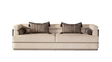 A modern upholstered sofa featuring a light-colored fabric, distinct dark wood and black metal arm detailing, and decorative throw pillows and bolster cushions. — 3D model