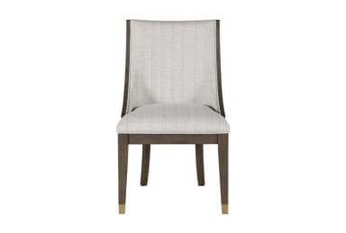 A side profile view of a dining chair. The chair features a dark-stained wooden frame with elegantly curved legs. The backrest is composed of vertical slats and is upholstered, as is the seat, in a light-colored, textured fabric. The front legs have decorative brass caps near the feet. — 3D model