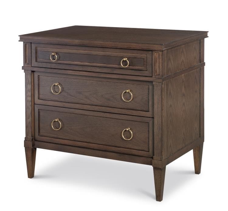 A transitional dark brown wood nightstand featuring three drawers with decorative brass ring pull hardware and tapered legs. The top drawer appears shallower, positioned above two deeper storage drawers. The wood exhibits a visible grain texture. — 3D model