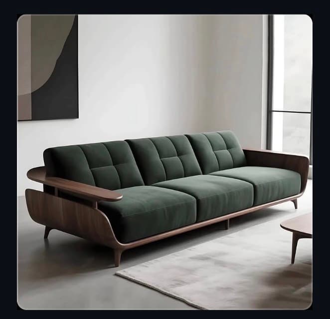 A three-seater sofa with a prominent, curved dark-toned wooden frame that forms the armrests and extends along the back and base. The sofa is upholstered in dark green velvet, featuring three separate seat cushions and a button-tufted backrest divided into three sections. The design has a distinctive mid-century modern aesthetic with tapered wooden legs. — 3D model