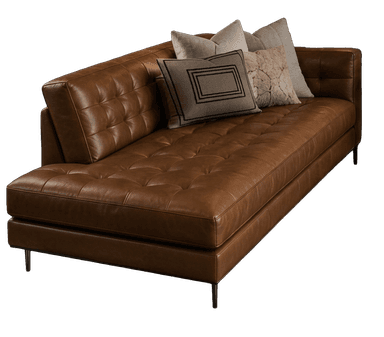 A modern tufted leather chaise lounge featuring a rich cognac brown finish, a single armrest, and slender black metal legs, accompanied by several decorative throw pillows. — 3D model