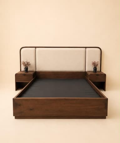 A contemporary platform bed made of dark walnut-finished wood, featuring an integrated upholstered headboard with light beige fabric panels and two attached nightstands with drawers and open shelves. — 3D model