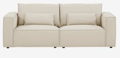 A modern two-seater sofa, presented in a studio shot, featuring a modular design. It is upholstered in a light, off-white fabric and composed of two distinct sections. Each section includes a deep seat cushion, a large rectangular back cushion, and a smaller accent pillow, all with visible piping detail. The arms are square and low-profile, contributing to a clean, contemporary aesthetic. — 3D model