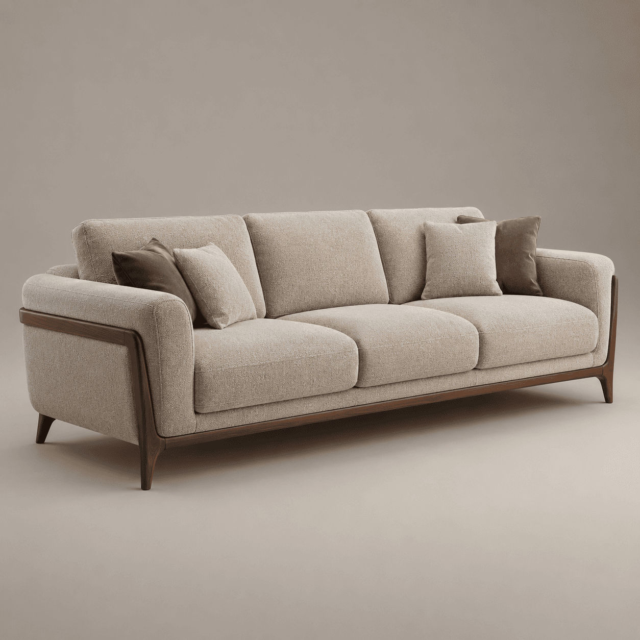 A modern three-seater sofa featuring light beige textured fabric upholstery and a visible dark wood frame that outlines the armrests and base. It has three loose seat cushions, three loose back cushions, and is accessorized with four smaller toss pillows in matching beige and contrasting dark brown. The sofa sits on four tapered wooden legs. — 3D model