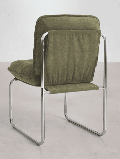An armless cantilever chair featuring a shiny chrome tubular steel frame and plush, olive green upholstered seat and back cushions. The cushions are individual, with the backrest displaying two button tufts. — 3D model
