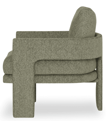 A contemporary armchair with a boxy, streamlined silhouette, fully upholstered in a greenish-gray fabric with a fine, speckled pattern. It features integrated block arms and a separate, removable seat cushion and back cushion. The base is also upholstered and integrated into the design, giving it a low-profile, solid appearance. — 3D model