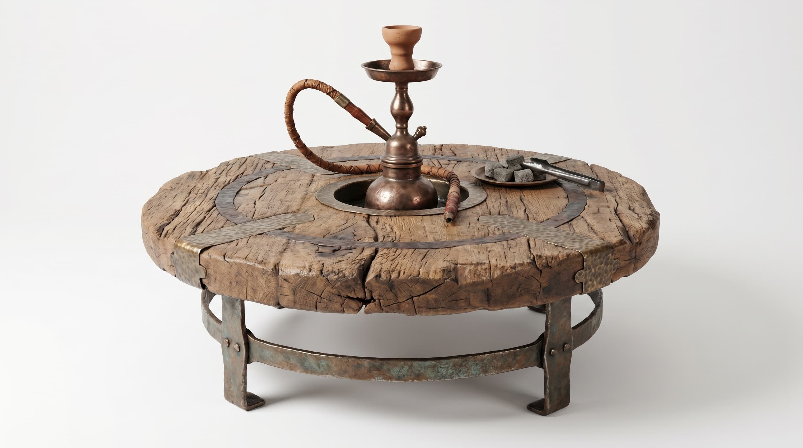 A round, rustic coffee table featuring a thick tabletop made from distressed reclaimed wood planks. The surface is adorned with hammered metal strips arranged in concentric and radial patterns. The table is supported by a robust, low-profile base constructed from forged iron, giving it an industrial aesthetic. A hookah is positioned on the tabletop, along with charcoal and tongs. — 3D model