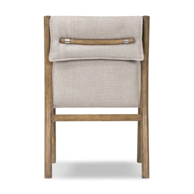 A modern dining chair with a wooden frame and upholstered seat and backrest. The frame has a natural wood finish and appears to be constructed from solid wood. The seat and backrest are covered in a light-colored, textured fabric. The design is minimalist with clean lines and a slightly curved back. — 3D model