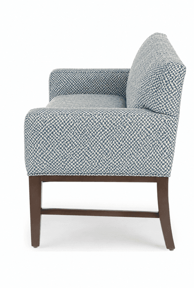 A modern upholstered armchair featuring a distinctive blue and white patterned fabric, dark wooden legs, and a single seat cushion. The arms are gently sloped. — 3D model