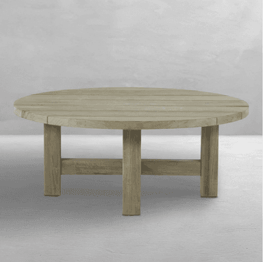 A round coffee table with a slatted top and a sturdy, minimalist base. The base consists of four legs connected by two horizontal beams. The overall design suggests outdoor use due to the material and style. — 3D model