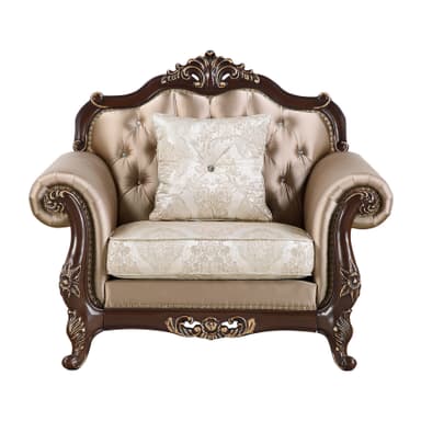 An ornate single-seater armchair featuring a dark, richly carved wooden frame with gilded accents, and plush, light beige upholstered seating. The chair's design includes a prominent crest rail with intricate rococo-style carvings, scrolled armrests, and cabriole-style legs, all detailed with gold. The upholstery is secured by continuous brass nailhead trim along the edges. — 3D model